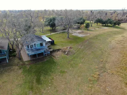 a view of a water with a yard