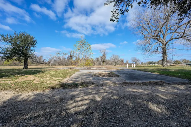 an aerial view of residential house with outdoor space