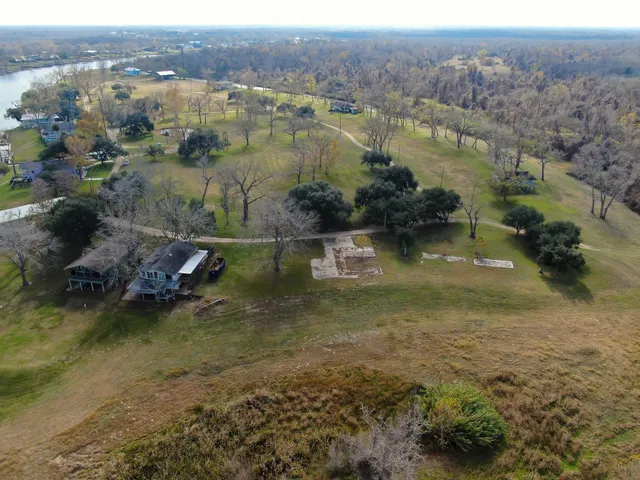 a view of a lake with a house