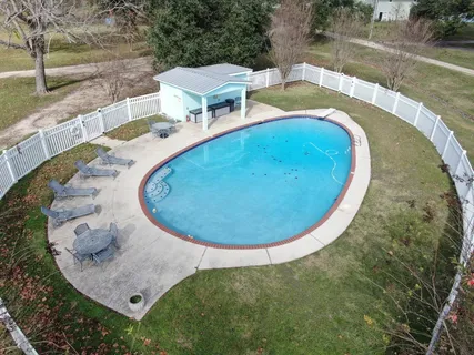 a view of a lake with a yard