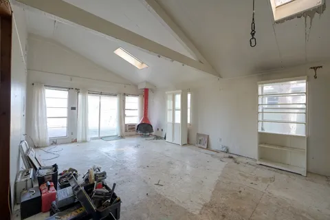 a view of a room with toys and a window