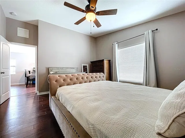 an aerial view of residential houses with city view