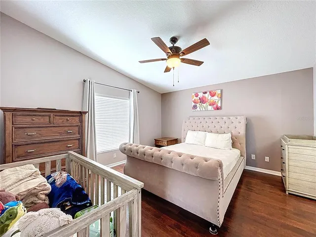 an aerial view of residential houses with city view