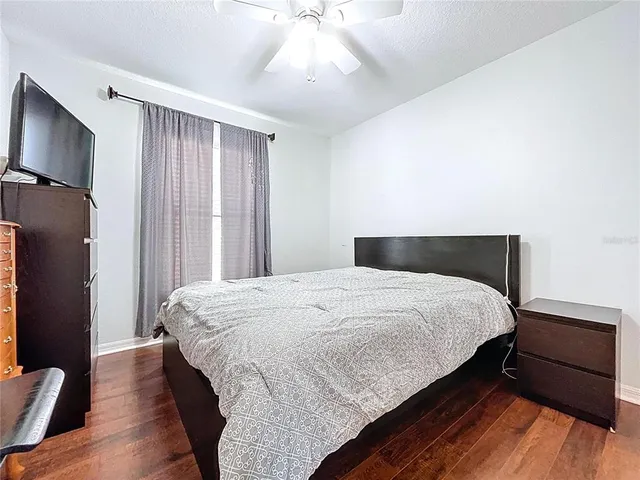 a front view of a house with a yard and a garage