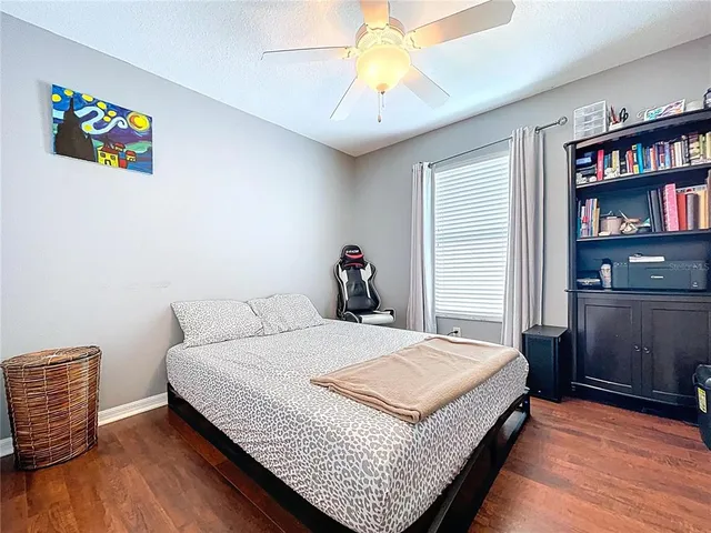 a front view of a house with a yard and a garage