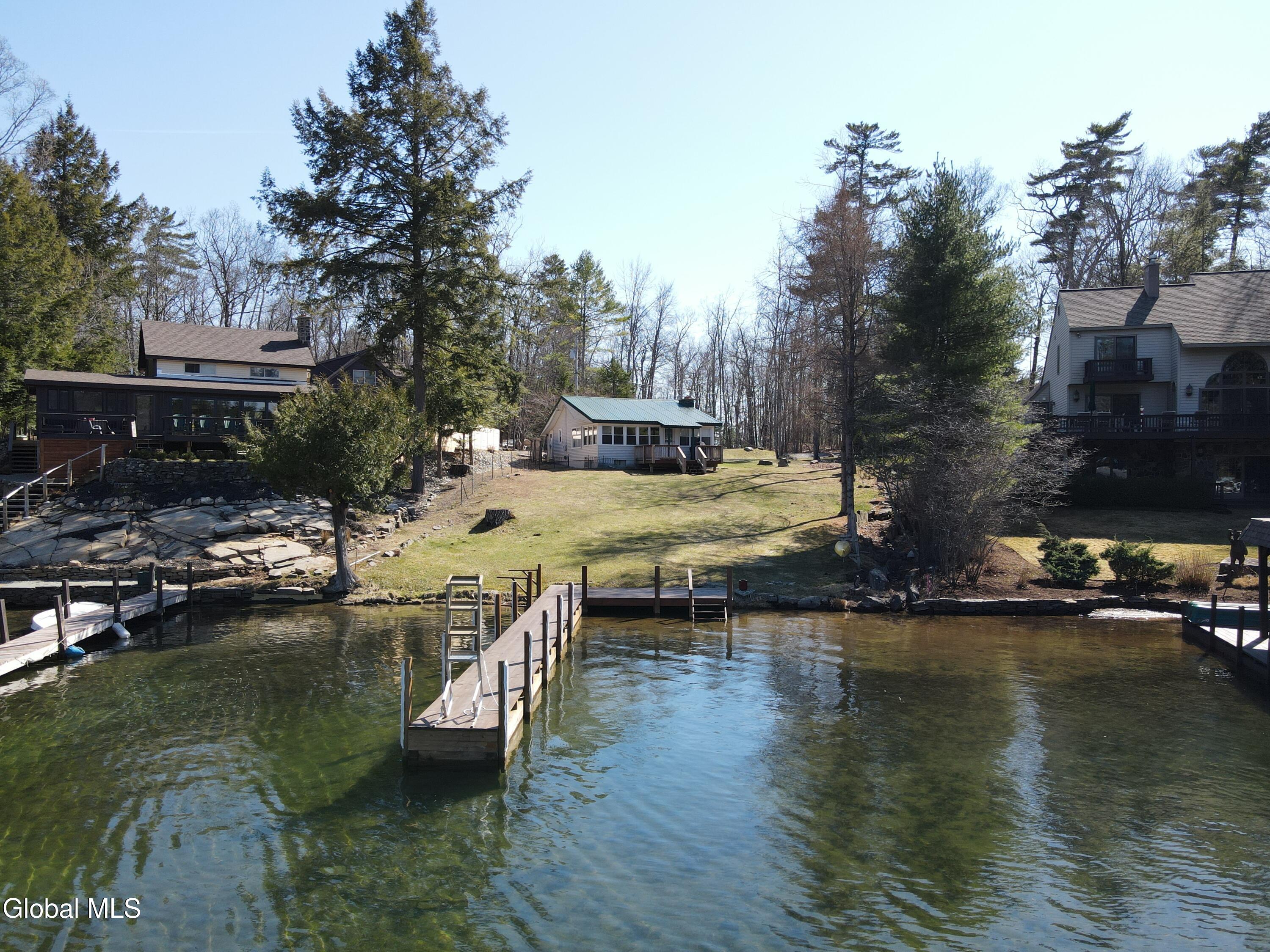 3320 Travis Point Way Kattskill Bay, NY 12844 - Photo 2 of 31 dji_fly_20260409_150430_491_177578171136