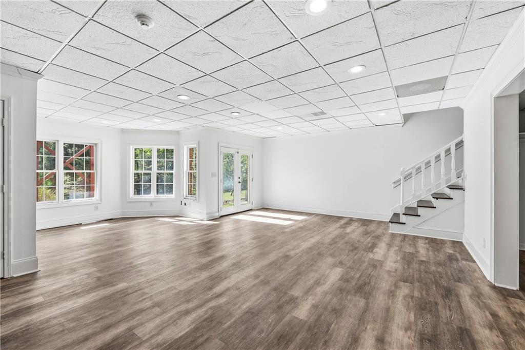 2240 Wilzman Trail Conyers, GA 30012 - Photo 39 of 72 a view of an empty room and wooden floor