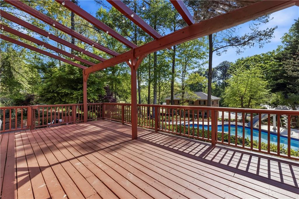 2240 Wilzman Trail Conyers, GA 30012 - Photo 51 of 72 a view of deck with wooden floor and outdoor space