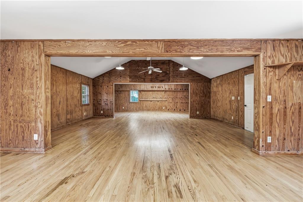 2240 Wilzman Trail Conyers, GA 30012 - Photo 68 of 72 wooden floor in an empty room with a window