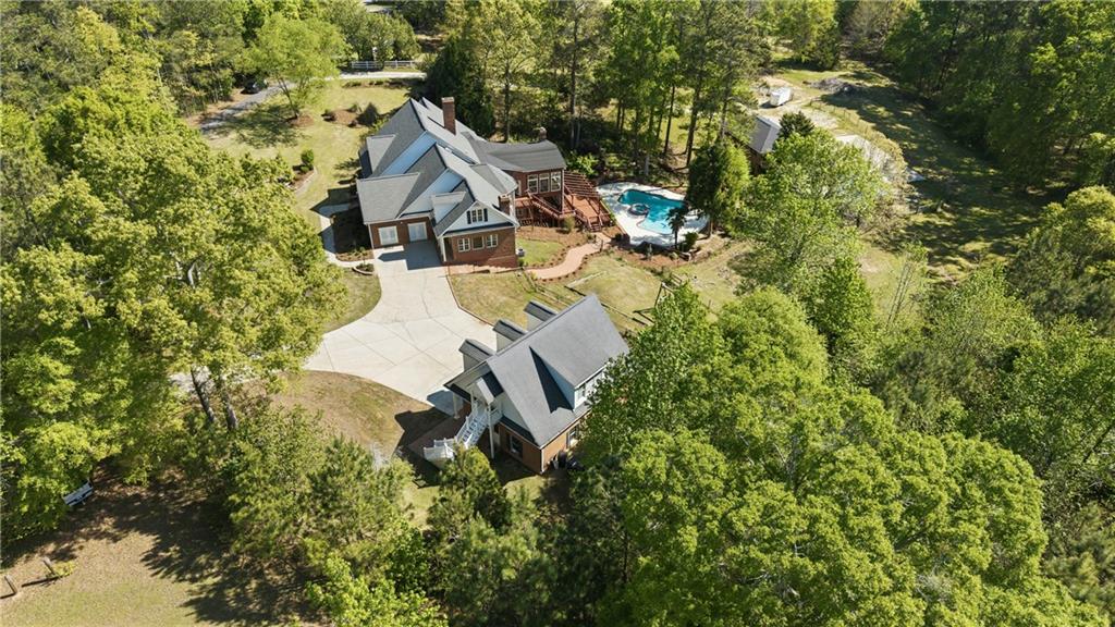 2240 Wilzman Trail Conyers, GA 30012 - Photo 70 of 72 an aerial view of residential house with outdoor space and trees all around