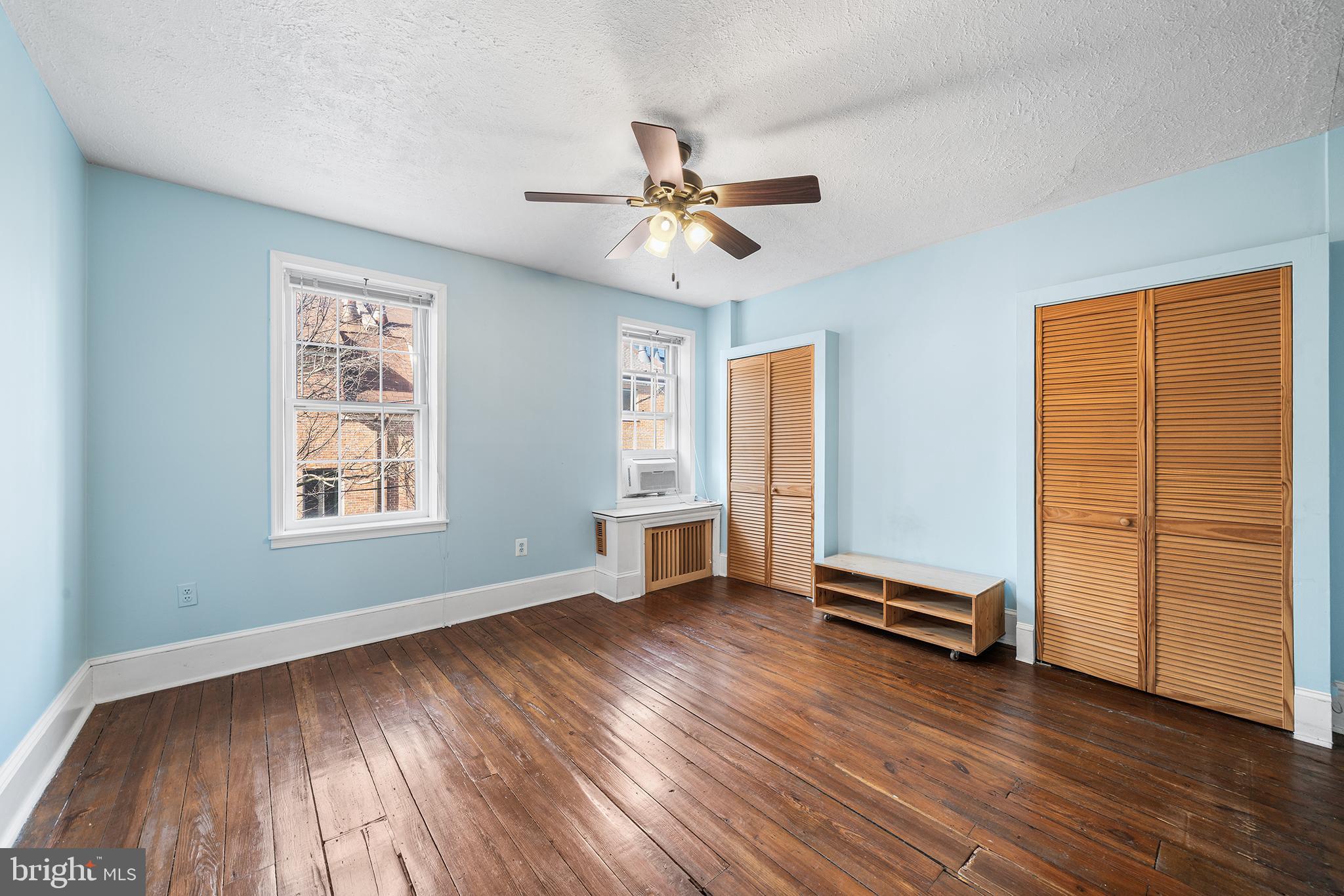 705 South Warnock Street Philadelphia, PA 19147 - Photo 17 of 28 wooden floor in an empty room with a window
