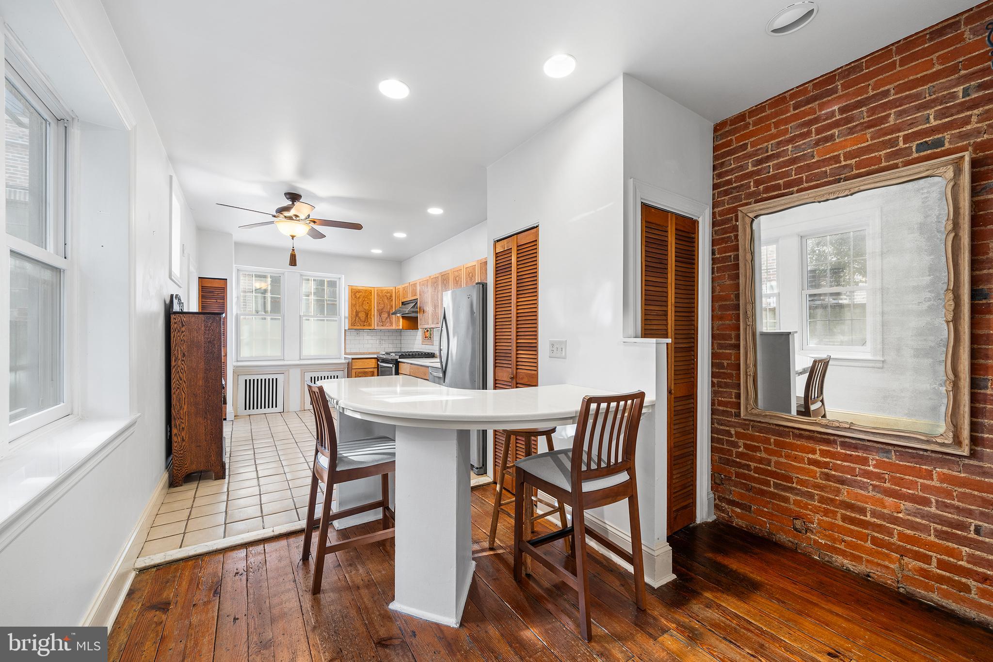 705 South Warnock Street Philadelphia, PA 19147 - Photo 6 of 28 a view of a dining room with furniture window and wooden floor