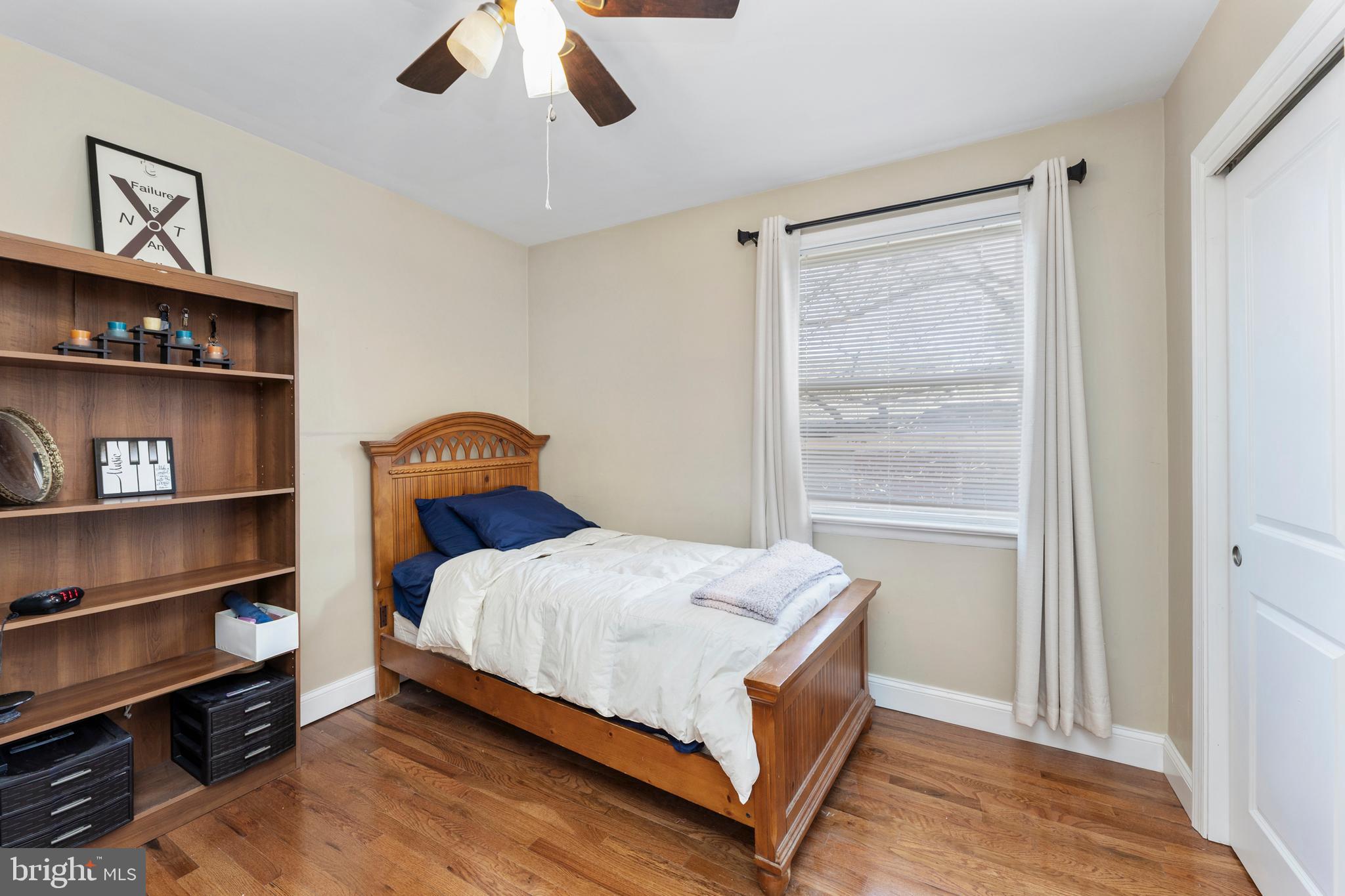 123 Walnut Street Northwest Washington, DC 20012 - Photo 16 of 59 a bedroom with a bed and a window