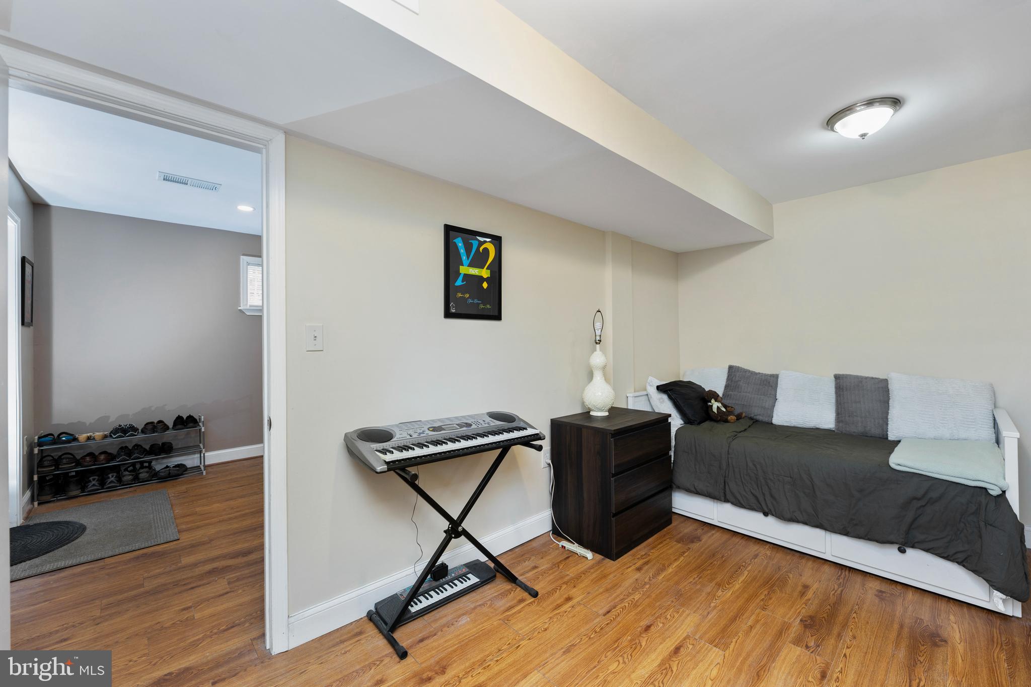 123 Walnut Street Northwest Washington, DC 20012 - Photo 39 of 59 a living room with furniture and a wooden floor