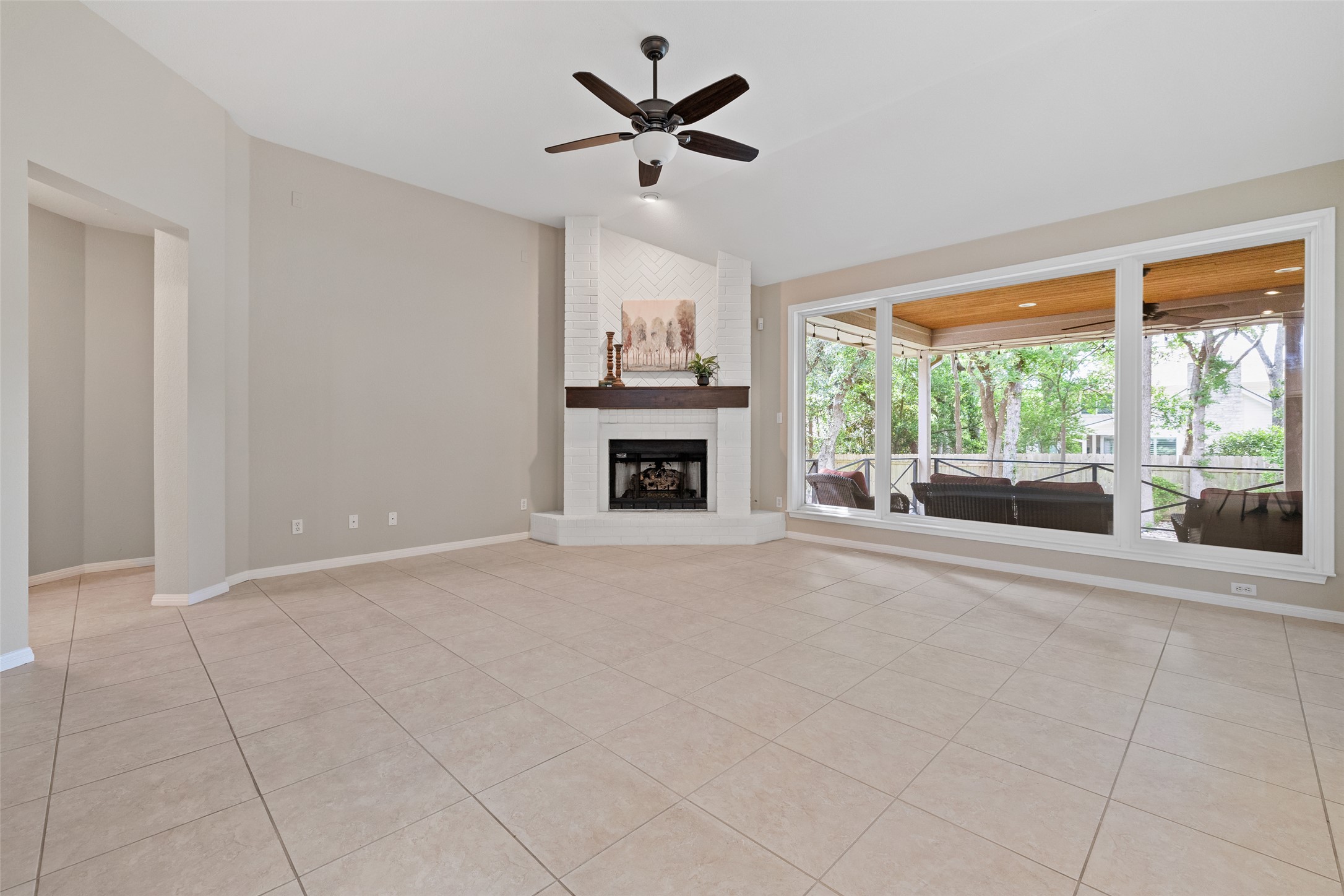 31000 Clearwater Court Georgetown, TX 78628 - Photo 23 of 39 a living room with furniture and a fireplace