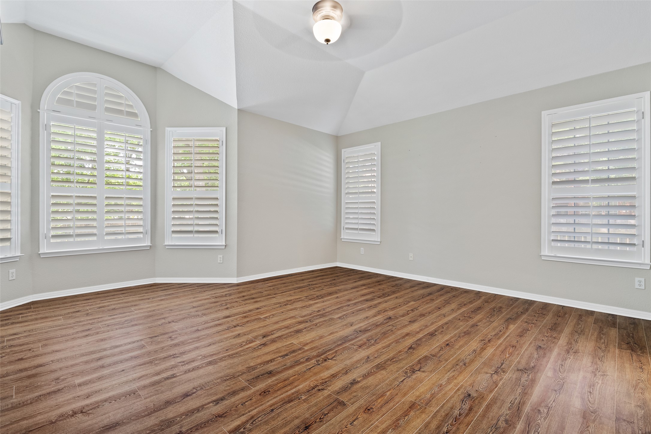 31000 Clearwater Court Georgetown, TX 78628 - Photo 27 of 39 an empty room with wooden floor and windows