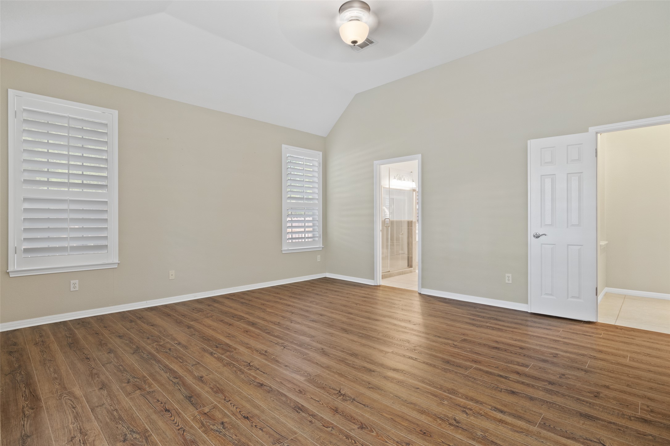 31000 Clearwater Court Georgetown, TX 78628 - Photo 29 of 39 an empty room with wooden floor and windows