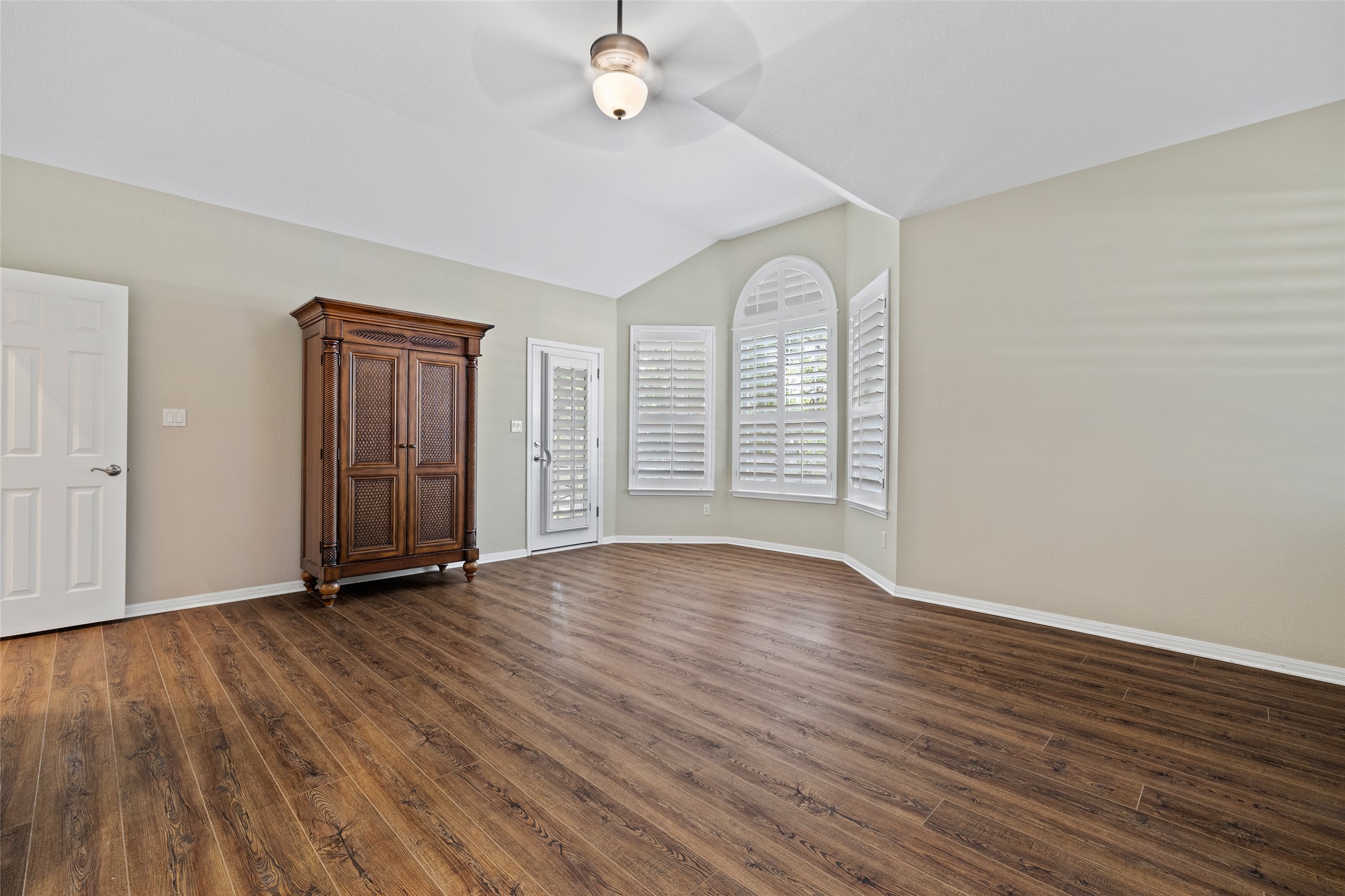 31000 Clearwater Court Georgetown, TX 78628 - Photo 30 of 39 an empty room with wooden floor and windows