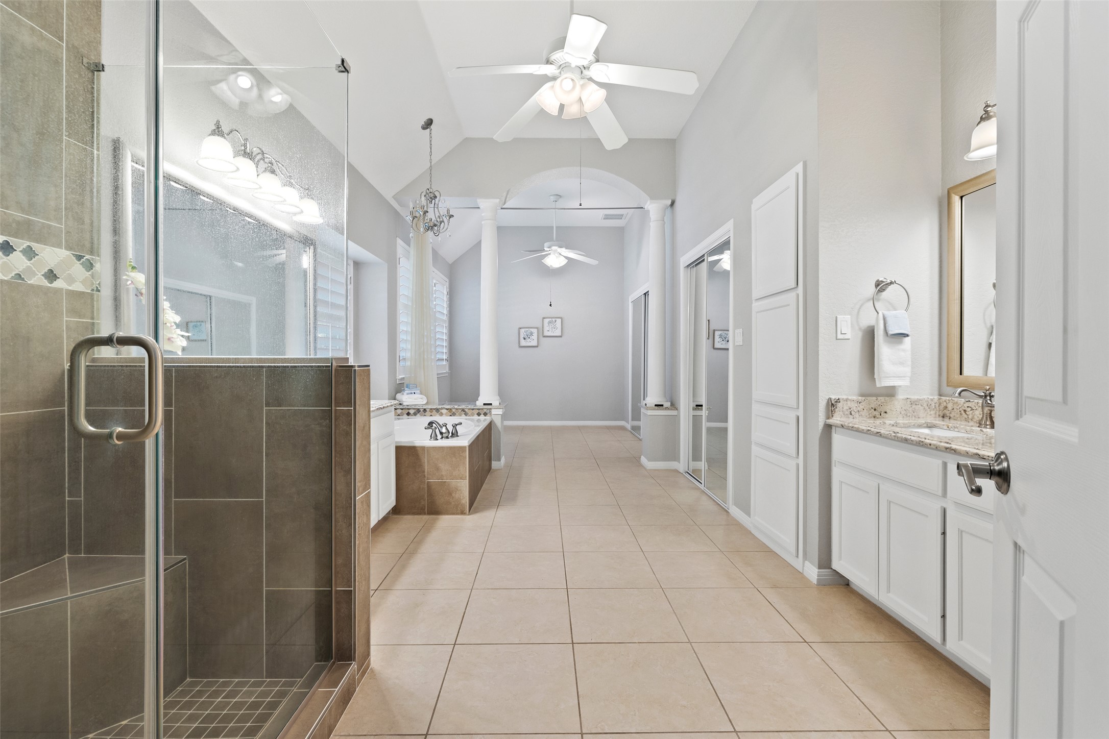 31000 Clearwater Court Georgetown, TX 78628 - Photo 31 of 39 Very large primary bathroom with separate dual vanities, a make up vanity, water closet, jetted tub & separate shower. Two walk-in closets with mirrored doors, plus a flex space area for several possible uses...