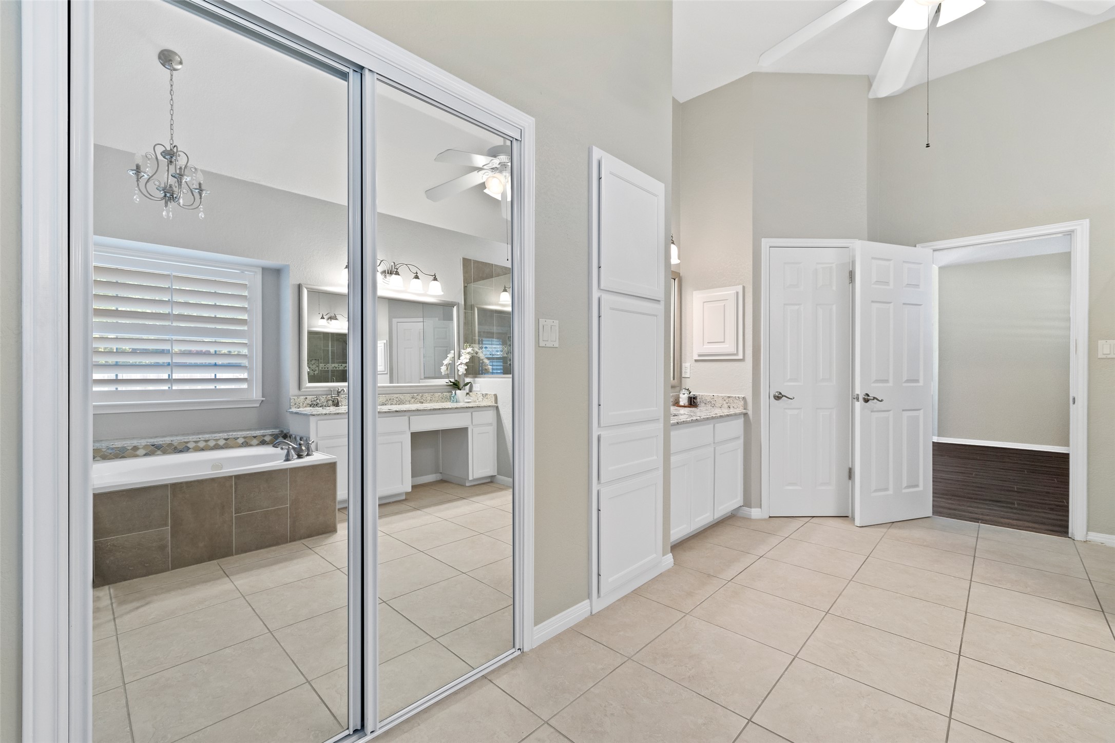 31000 Clearwater Court Georgetown, TX 78628 - Photo 36 of 39 a large white bathroom with a glass shower door and a bathtub
