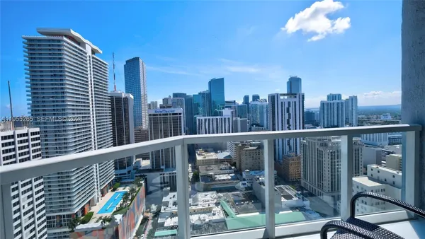a view of a balcony with city view