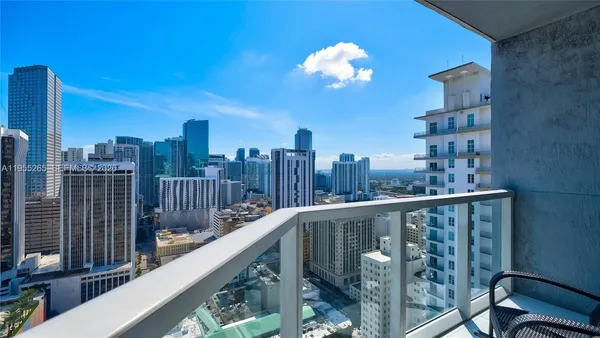 a view of a balcony with city view