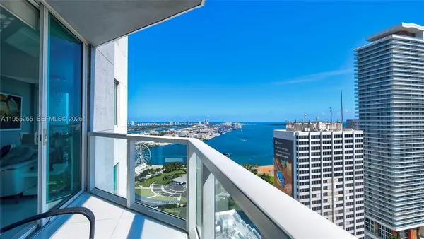 a view of balcony with furniture