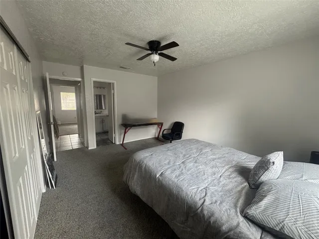 a view of yard with car parked