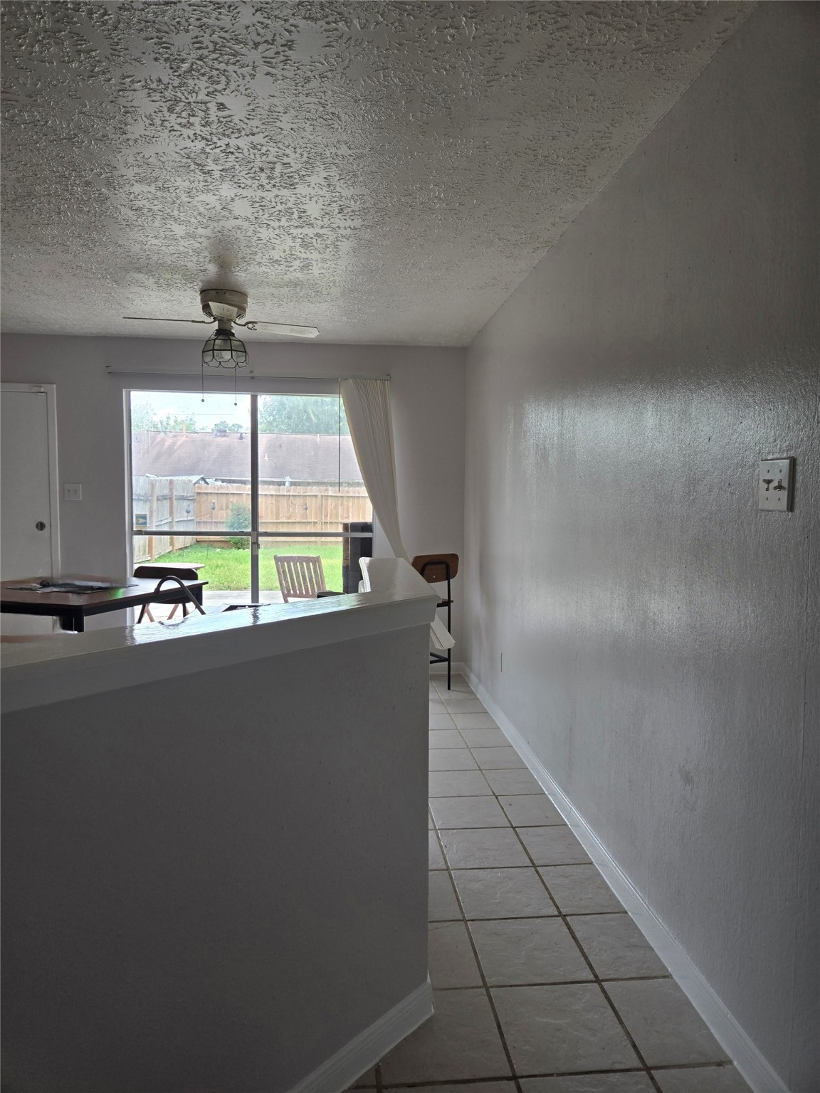 2323 Spring Dusk Drive Spring, TX 77373 - Photo 10 of 19 a view of an empty room with a window