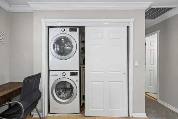 a utility room with dryer and washer