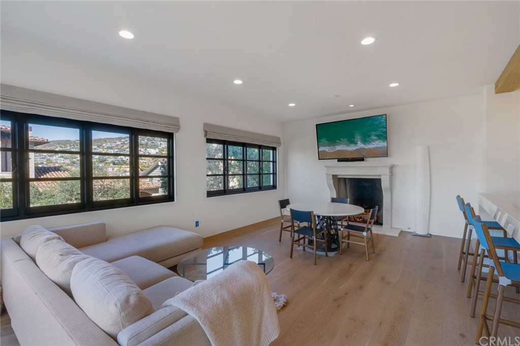 4 Emerald Bay Laguna Beach, CA 92651 - Photo 21 of 75 a living room with furniture and a large window