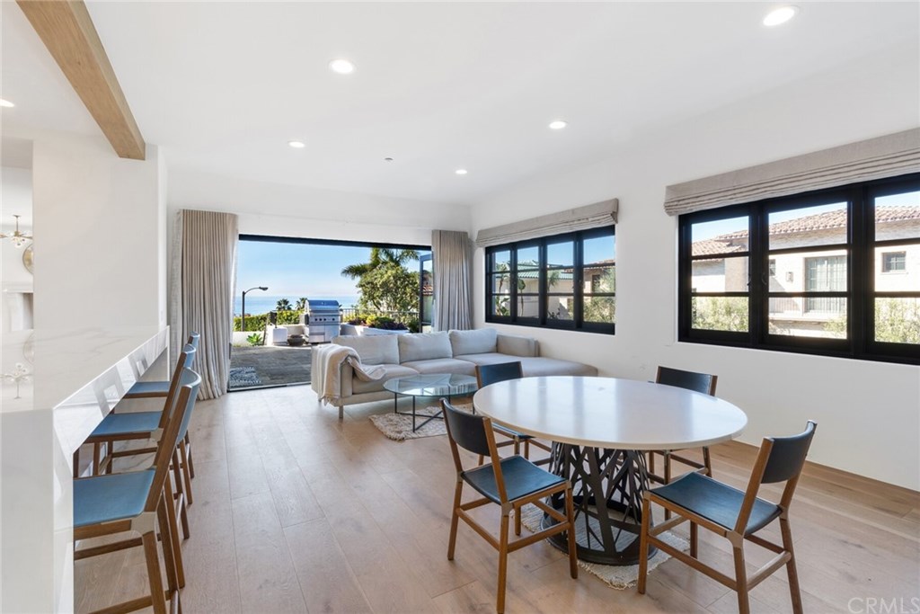 4 Emerald Bay Laguna Beach, CA 92651 - Photo 33 of 75 a view of a dining room with furniture and a potted plant
