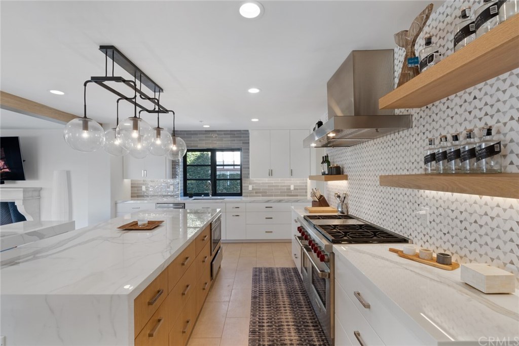 4 Emerald Bay Laguna Beach, CA 92651 - Photo 47 of 75 a kitchen that has a lot of cabinets in it