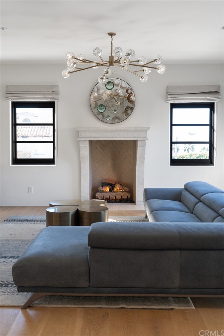 4 Emerald Bay Laguna Beach, CA 92651 - Photo 57 of 75 a living room with furniture and a fireplace
