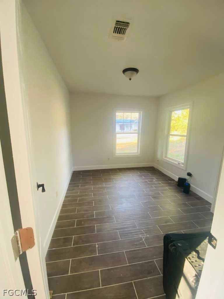 5136 McDonald Road Zellwood, FL 32798 - Photo 11 of 17 a view of an empty room and a window