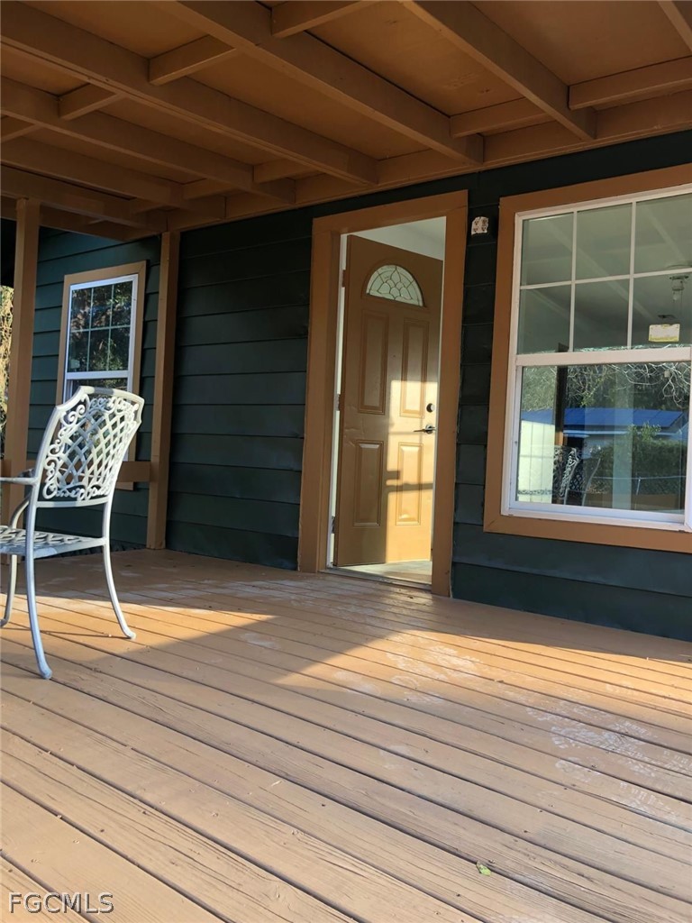 5136 McDonald Road Zellwood, FL 32798 - Photo 14 of 17 a view of outdoor space and deck