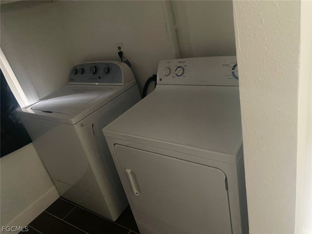 5136 McDonald Road Zellwood, FL 32798 - Photo 17 of 17 a utility room with dryer and washer