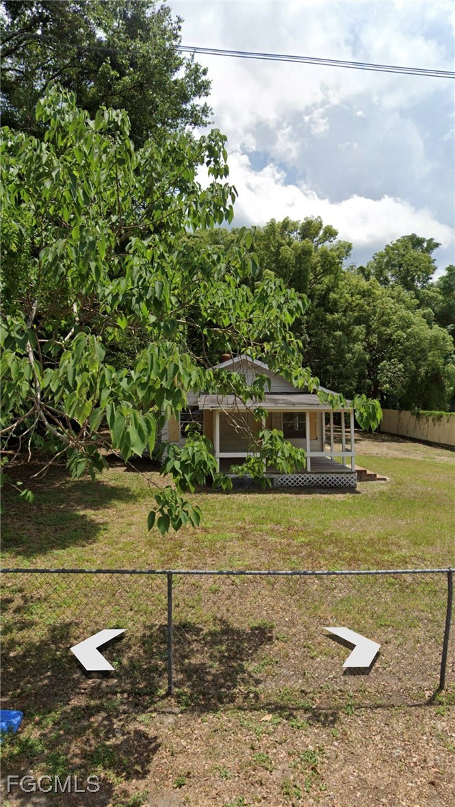 5136 McDonald Road Zellwood, FL 32798 - Photo 3 of 17 a front view of a house with a yard