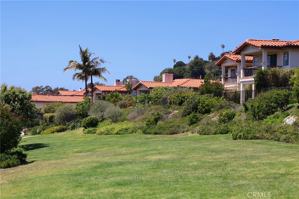 6508 Sandy Point Court Rancho Palos Verdes, CA 90275 - Photo 52 of 66 a front view of a house with a yard