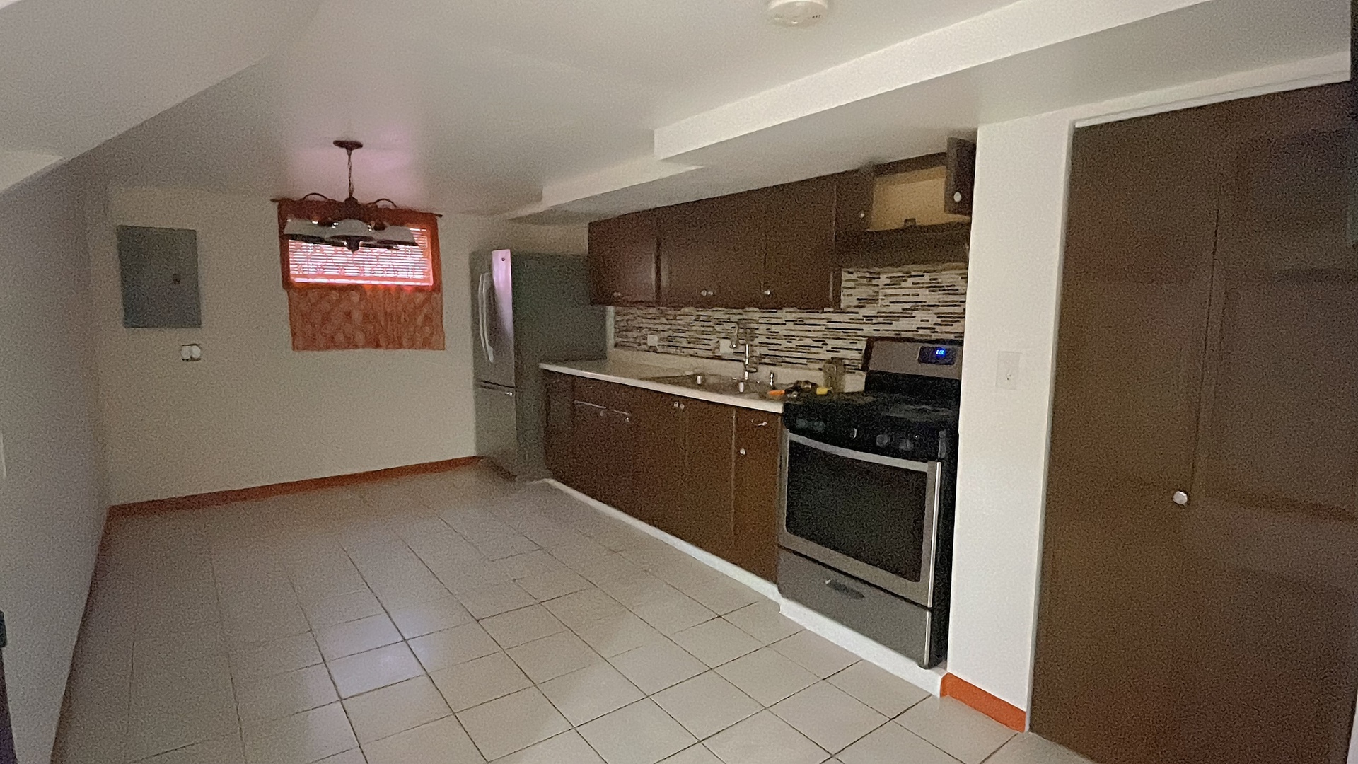 Undisclosed Address Chicago, IL 60629 - Photo 12 of 18 a kitchen with stainless steel appliances granite countertop a stove and a refrigerator
