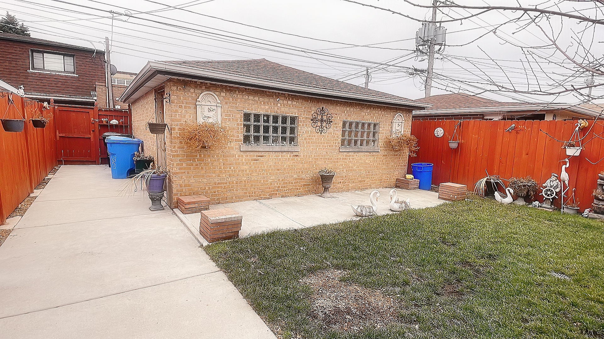 Undisclosed Address Chicago, IL 60629 - Photo 17 of 18 a front view of a house with a yard