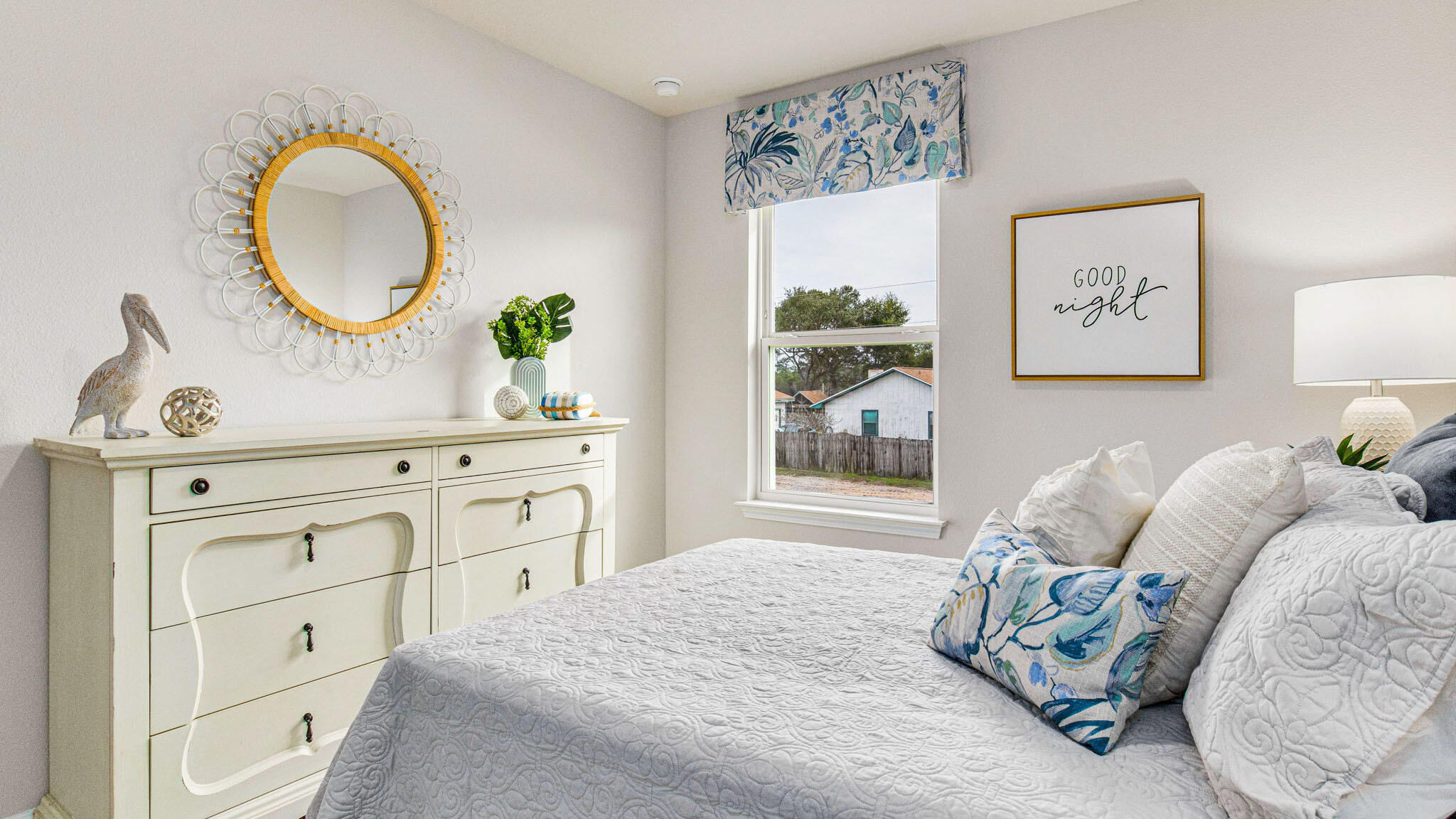 329 Callie Drive Crestview, FL 32536 - Photo 25 of 27 a bedroom with a bed and a dresser