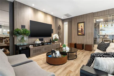 a bathroom with a toilet a sink and a shower