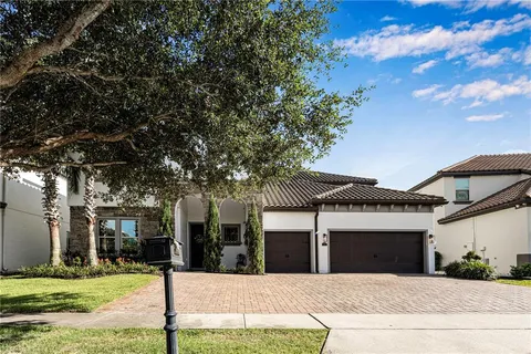 an aerial view of a house with a garden