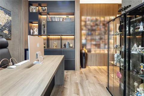 a spacious bathroom with a double vanity sink a mirror and a shower