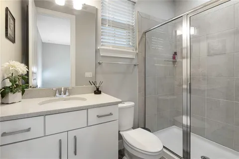 a view of a lake with a building in the background