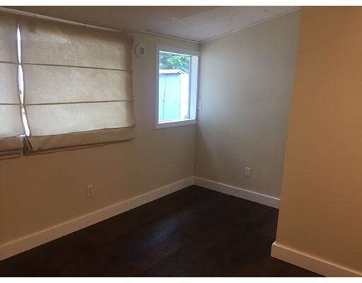 39 Sled Road Ashburnham, MA 01430 - Photo 14 of 23 a view of a small space with wooden floor and a window