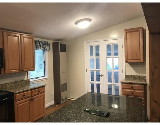 39 Sled Road Ashburnham, MA 01430 - Photo 7 of 23 a view of kitchen with granite countertop cabinets and refrigerator