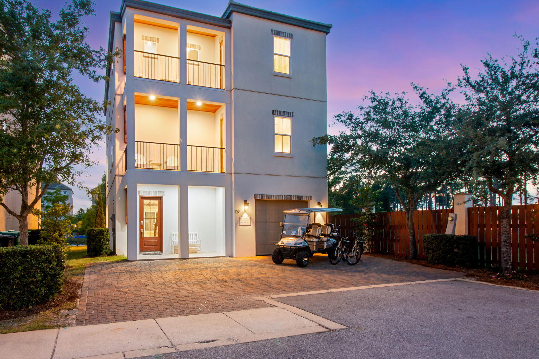 a view of a brick building next to a yard