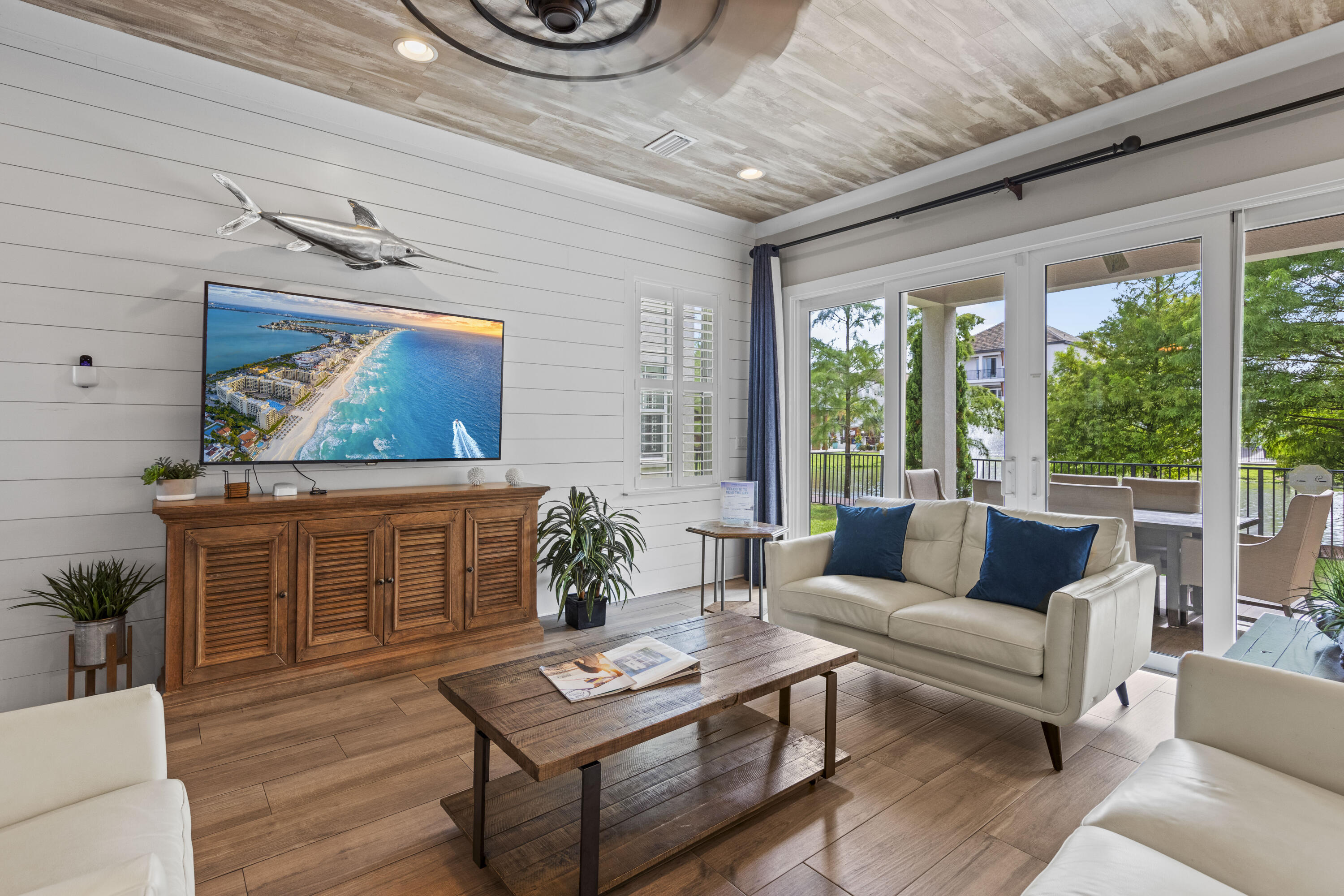 43 Calla Way Miramar Beach, FL 32550 - Photo 11 of 59 a living room with furniture and a flat screen tv